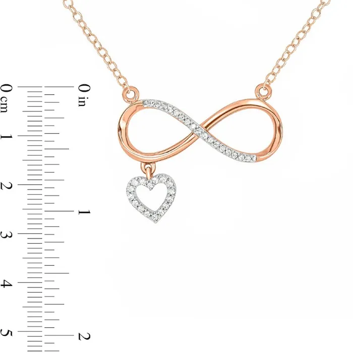 Necklaces 01 CT TW Natural Diamond Sideways Infinity with Heart Dangle Necklace in 10K Rose Gold Goldia Necklaces 01 CT TW Natural Diamond Sideways Infinity with Heart Dangle Necklace in 10K Rose Gold Goldia